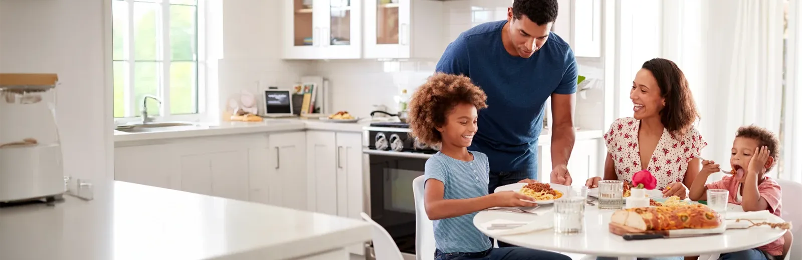 family eating dinner pest free home