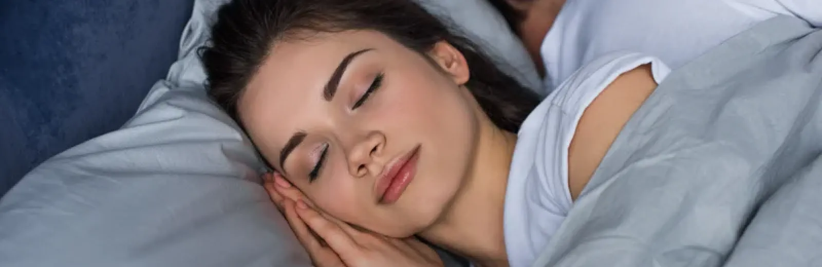 woman sleeping in bed bug free bed