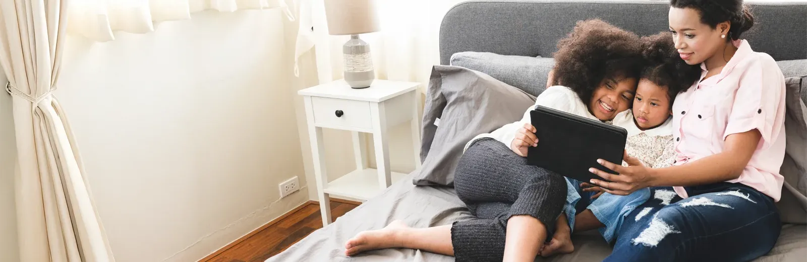 mom reading book to her kids in pest free home