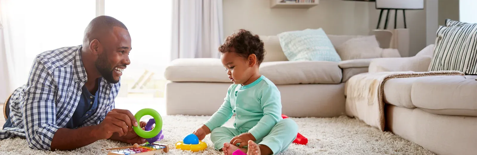 father and toddler playing in pest free home